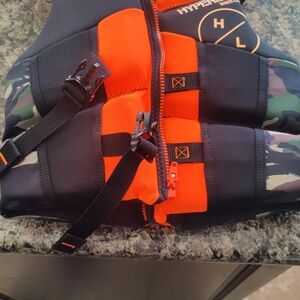 New Hyperlite Orange & Black Vest Youth. Never Used. $70 + Tax @ Wal-Mart